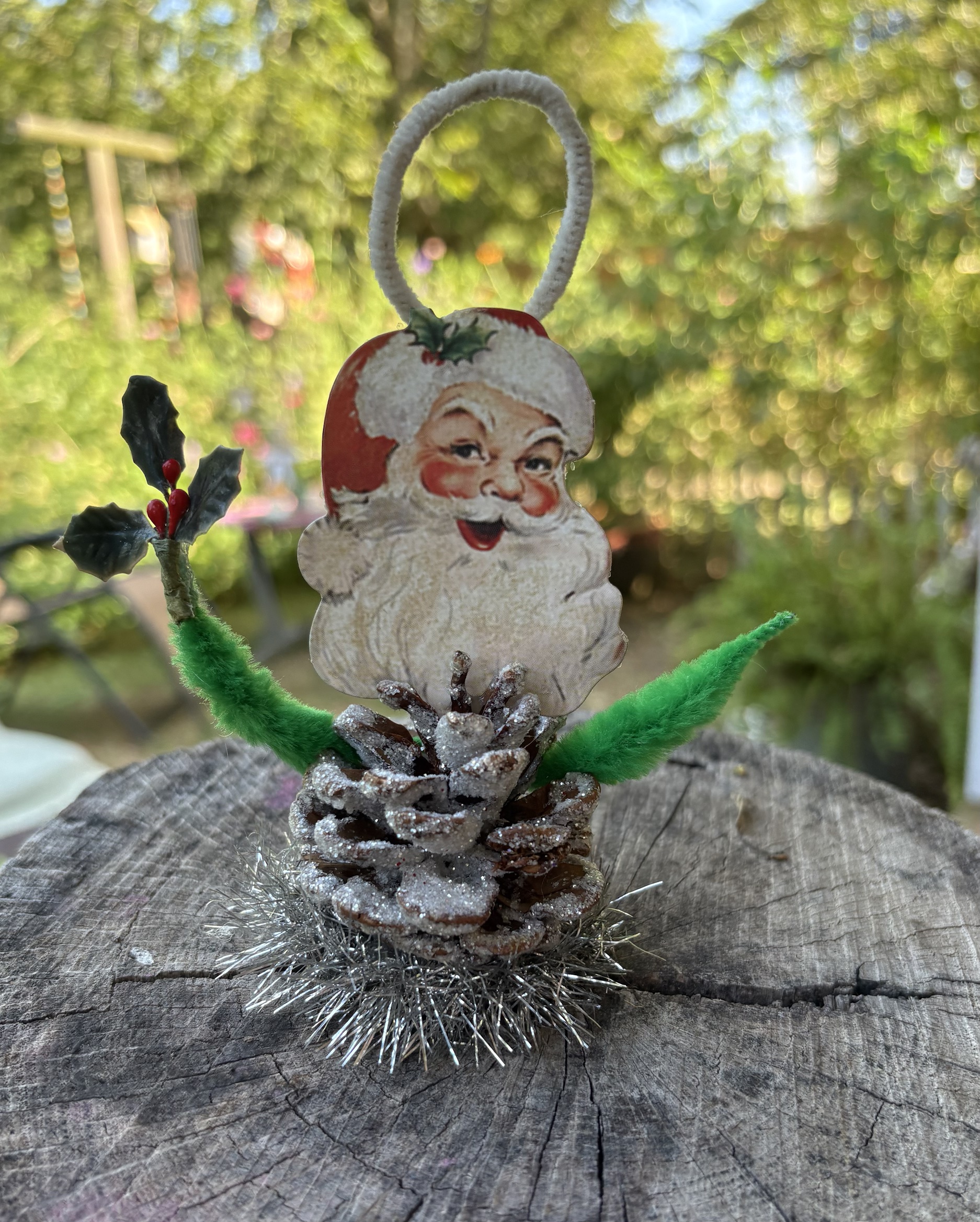 Jolly Santa Pinecone tabletop tableau holding vintage holly