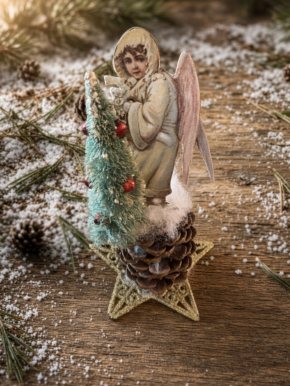 Snow Angel with bottle-brush tree tabletop tableau on a pine table