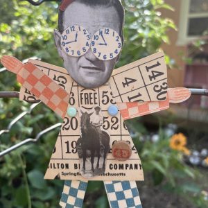 The Duke Plays Bingo ornament, John Wayne with clock-face eyes